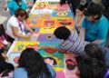 Bordan gigantesca manta contra la violencia hacia mujeres y niños