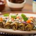 Prepara unos tacos dorados de res en salsa verde