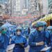 Familiares de víctimas de COVID-19 en Wuhan denuncian censura en visita de OMS