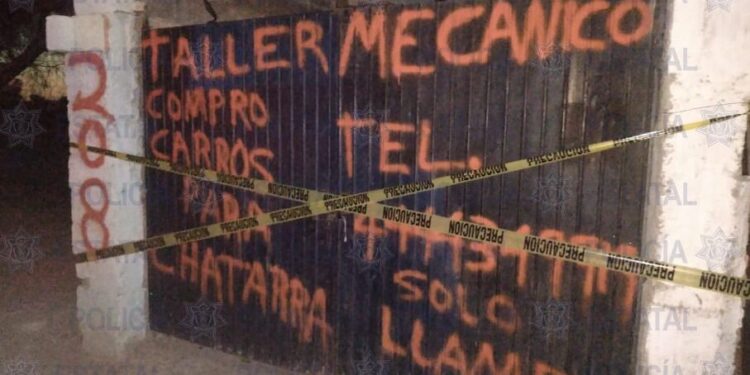 Policías Estatales encontraron posibles autos robados en un taller; piden orden de cateo