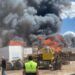 Incendio en bodega clandestina de tarimas en Pozos
