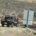 VIDEO: Exhiben a agente que cobra “derecho de paso” a colombianos en Chihuahua