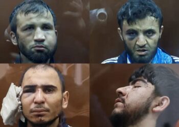 Presentan golpeados a sospechosos de atentado en Rusia