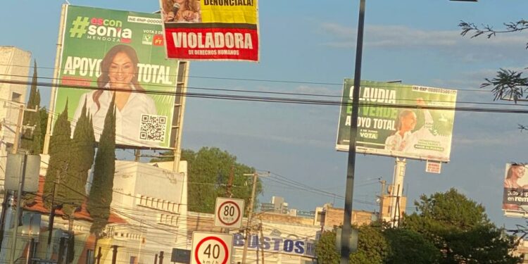 Colocan mantas contra la presidenta de la CEDH